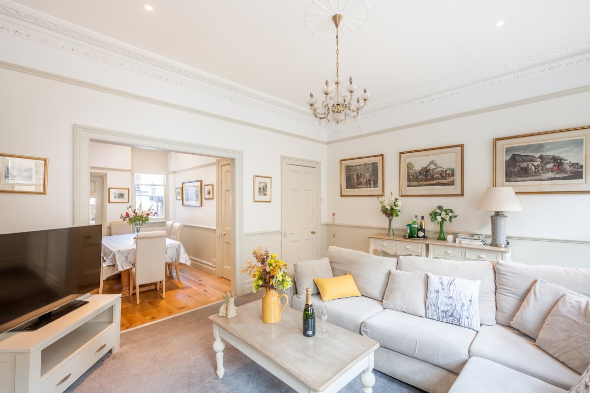 Tylney House - sociable corner sofa and wide screen TV